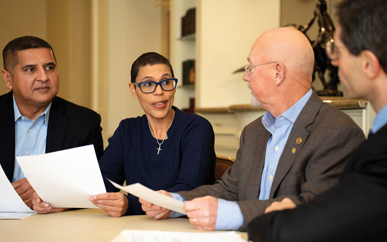 Fort Worth club members (from left) Sameer Vaidya, Samantha Renz, Chris Jordan, and Carlo Capua